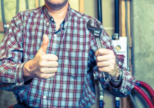 Mechanic Giving a Thumbs Up After Performing a Furnace Service in the St. Louis MO area