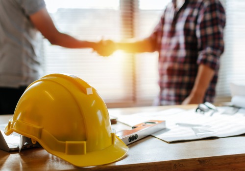 Client Shaking Hands with a Heating Contractor in the St. Louis MO area