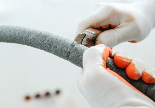 Hands Repairing Residential Heating in Wentzville MO