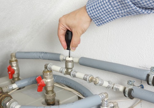 Closer Up of Man Repairing Residential Heating in Kirkwood MO