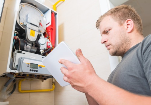 Heating Contractor near Wentzville MO, Working on a Furnace