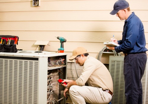 Air Conditioning Repair being done on a residential unit in the St. Louis MO area