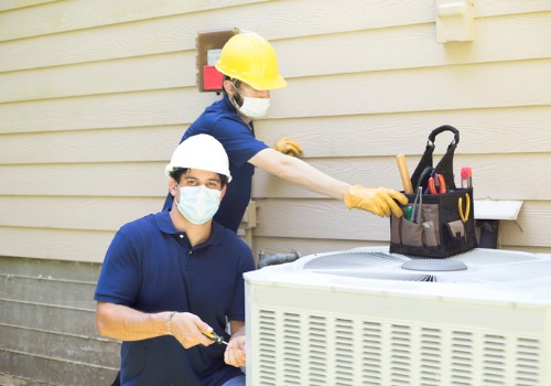 Technicians performing Air Conditioning Repair in Creve Coeur MO 