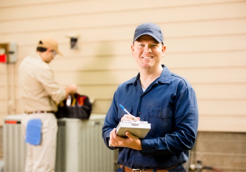 An HVAC tech is seen at work. Xcell Williams performs HVAC inspection in Warrenton MO.