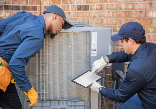 Two technicians provide Air Conditioning Maintenance in Warrenton MO